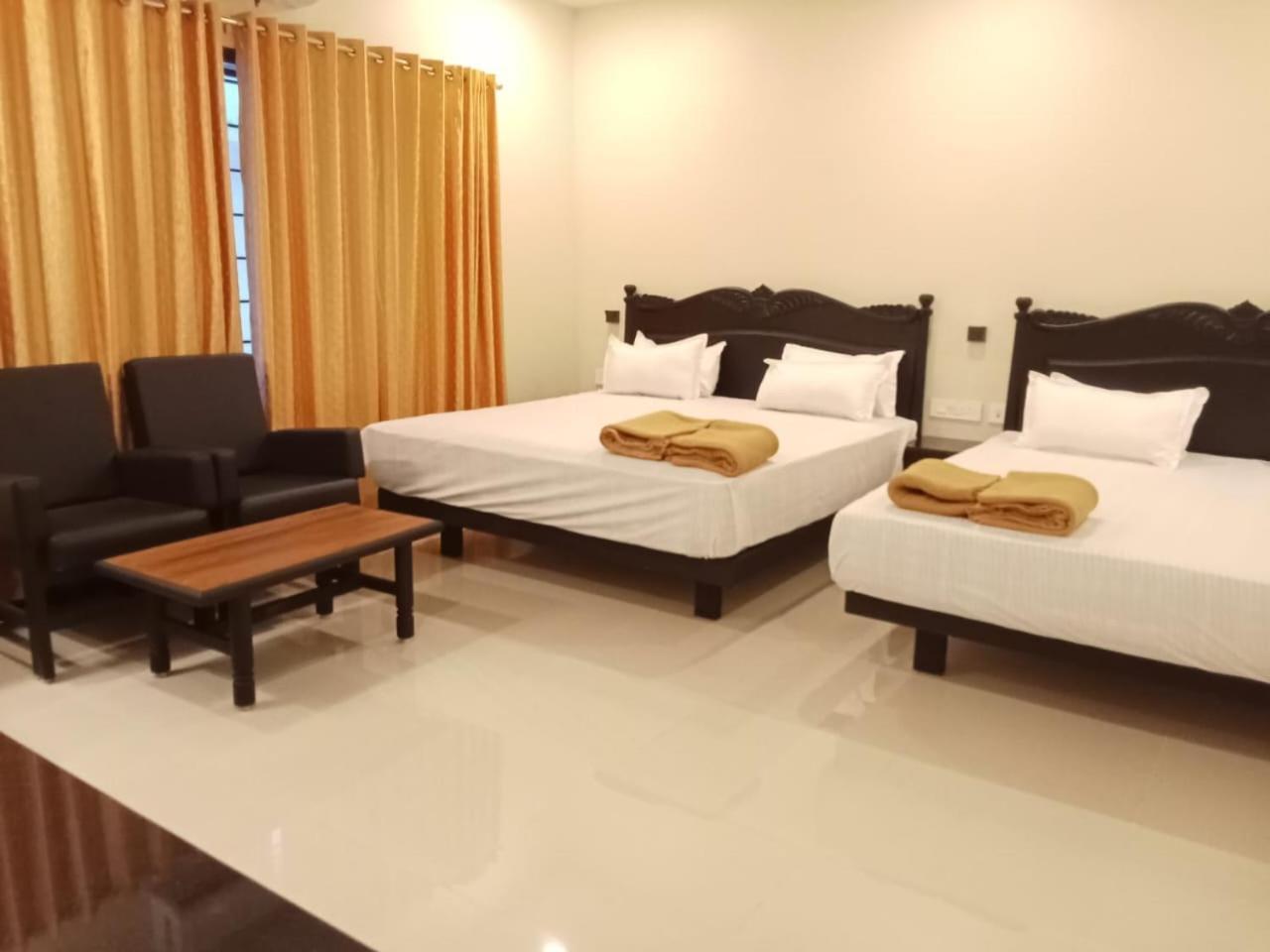 Hotel Sri Devi Канниякумари Экстерьер фото